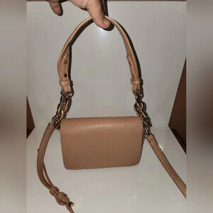 Madison West beige crossbody purse with gold chain strap